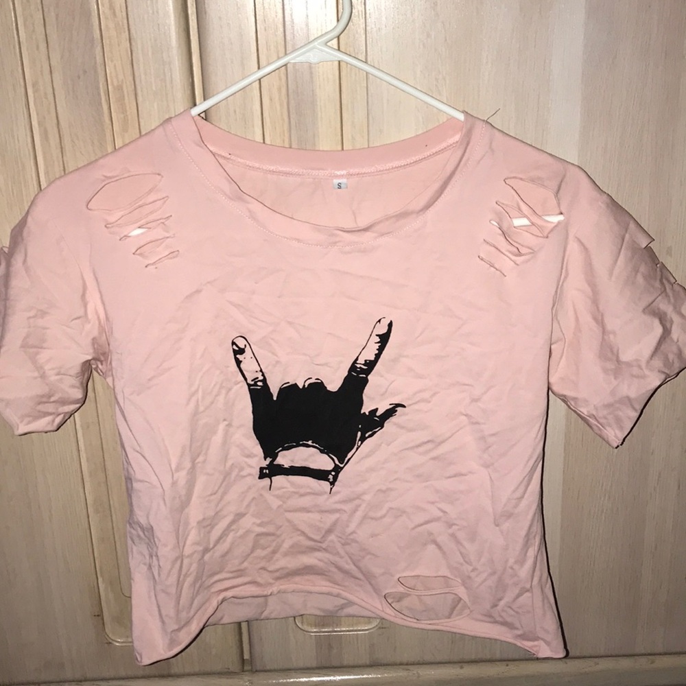 Cropped tee with stylish rips (not revealing)